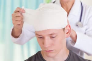 a man receiving treatment for his head injury