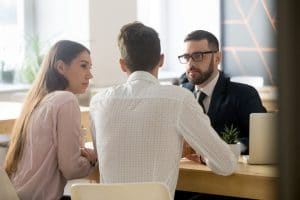 An Austin, TX, lawyer working with clients after a car accident.