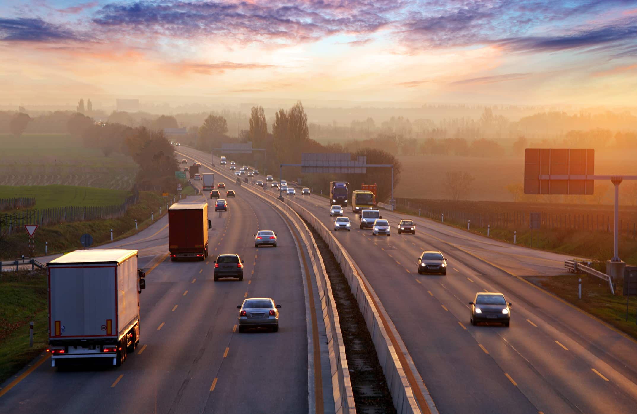 Cars and trucks driving on Texas interstate