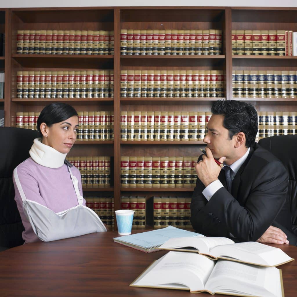 A slip and fall lawyer in Austin, Texas meets with an injured lady to discuss how he can help her get compensation that she deserves.
