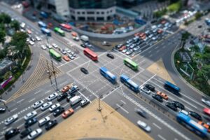 Aerial view of a complex, multi-lane intersection in San Antonio with heavy traffic flow and diverse vehicle types.