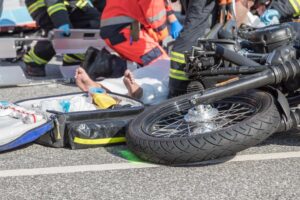 Rescue workers are trying to recover a seriously injured motorcyclist in Texas.
