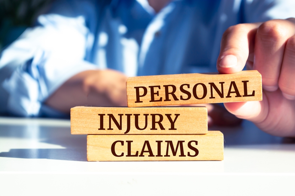 Wooden blocks with words 'Personal injury claims'.